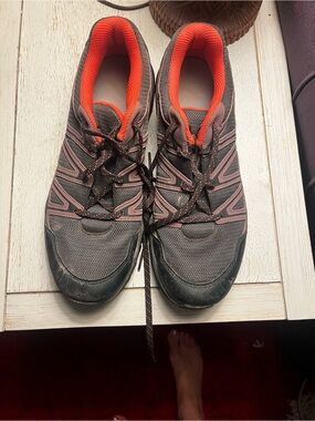 Salomon women’s  Gray/purple trail sneakers with Orange Lining